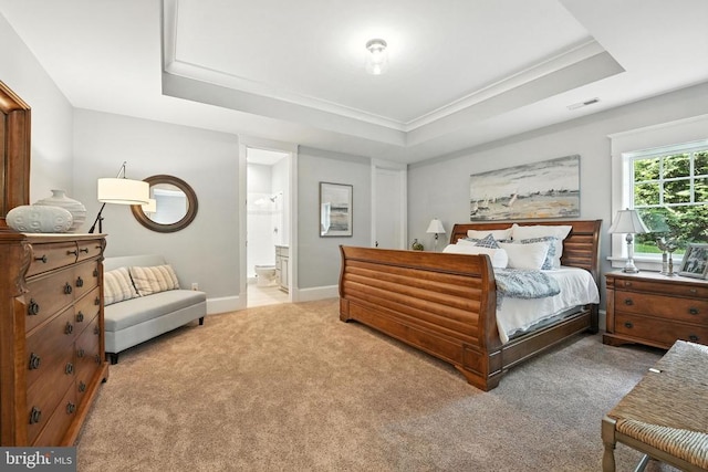 11109 Vanderbilt Cv, Spotsylvania, VA 22551 - carpeted bedroom featuring a tray ceiling and ensuite bath