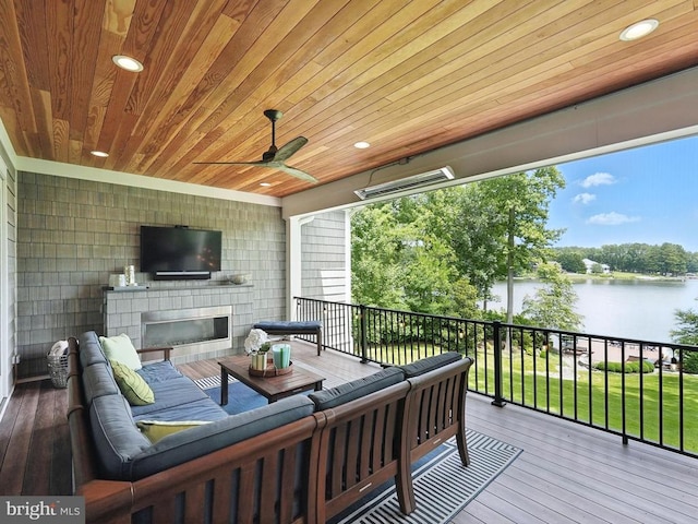 11109 Vanderbilt Cv, Spotsylvania, VA 22551 - deck featuring an outdoor living space with a fireplace and ceiling fan