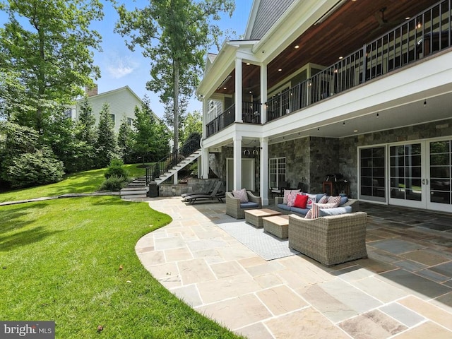 11109 Vanderbilt Cv, Spotsylvania, VA 22551 - patio / terrace featuring a patio, a lawn, outdoor lounge area, stairs, and french doors