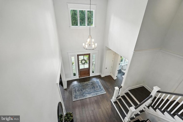 11109 Vanderbilt Cv, Spotsylvania, VA 22551 - foyer featuring plenty of natural light, a chandelier, dark wood-style floors, a high ceiling, and stairway