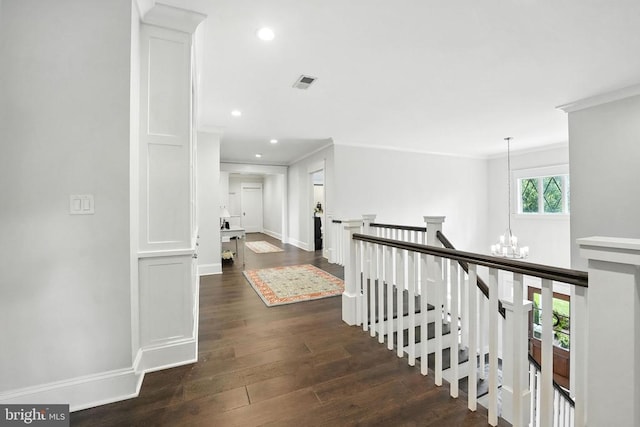 11109 Vanderbilt Cv, Spotsylvania, VA 22551 - hallway with an upstairs landing, a chandelier, crown molding, dark wood finished floors, and recessed lighting