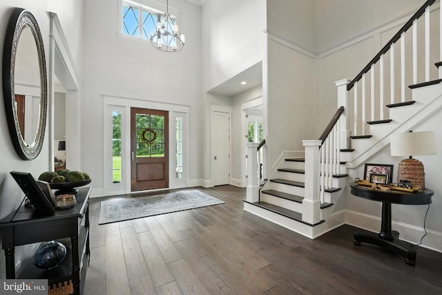 11109 Vanderbilt Cv, Spotsylvania, VA 22551 - entryway featuring dark wood-style flooring, a chandelier, stairs, and a high ceiling