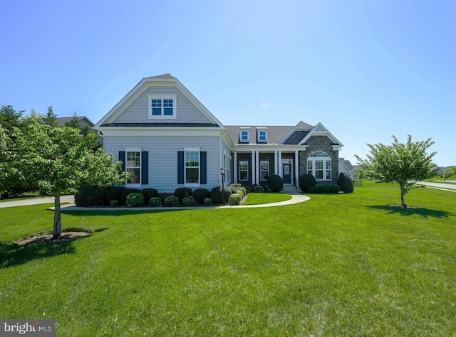 11708 Eagle Ridge Dr, Spotsylvania, VA 22551 - view of front of home with metal roof, a front yard, and a standing seam roof