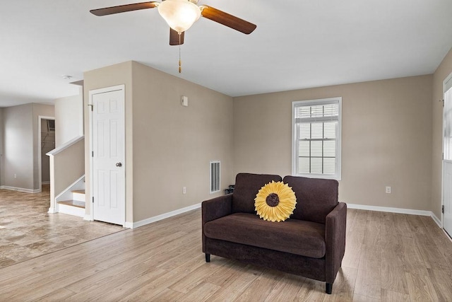 43 Upland Ct, Stuarts Draft, VA 24477 - sitting room with ceiling fan, light wood-style flooring, and stairway