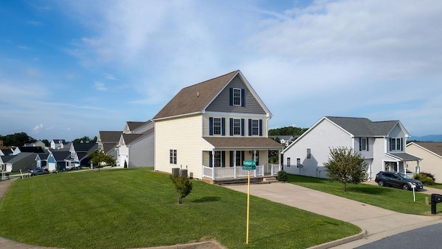 43 Upland Ct, Stuarts Draft, VA 24477 - traditional home featuring covered porch, a front yard, and a residential view