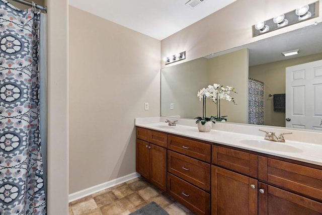 43 Upland Ct, Stuarts Draft, VA 24477 - full bathroom featuring double vanity and stone finish floors