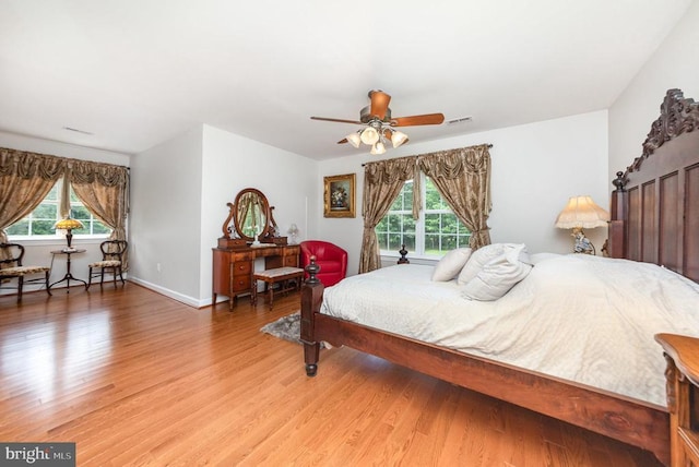 8421 Heron Pointe Way, Spotsylvania, VA 22551 - bedroom featuring light wood-style flooring, multiple windows, and ceiling fan
