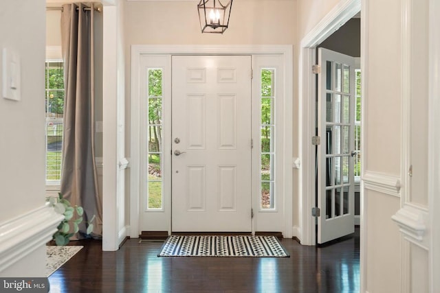 entryway featuring dark wood finished floors