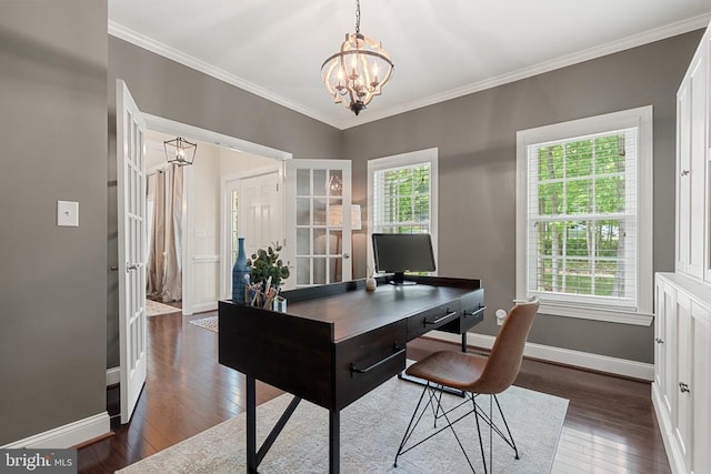home office with a chandelier, dark wood finished floors, baseboards, ornamental molding, and french doors