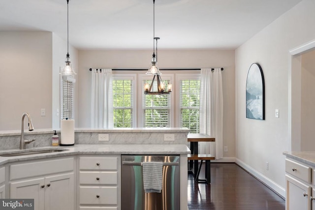 kitchen featuring dishwasher, a sink, white cabinetry, dark wood finished floors, and baseboards