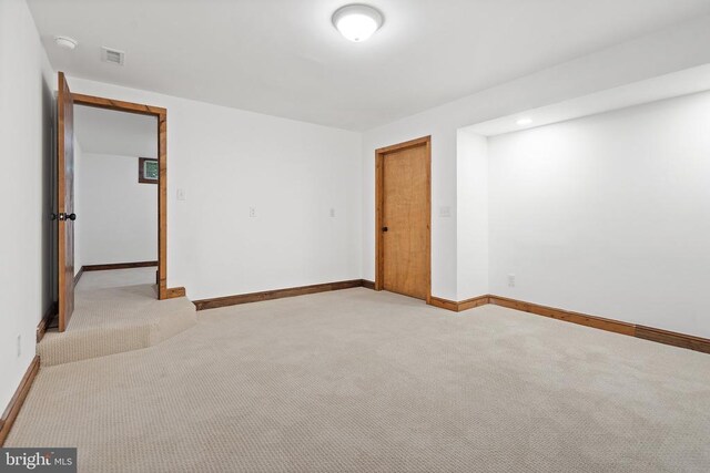 15395 Rillhurst Dr, Culpeper, VA 22701 - empty room with light colored carpet, baseboards, and a smoke detector