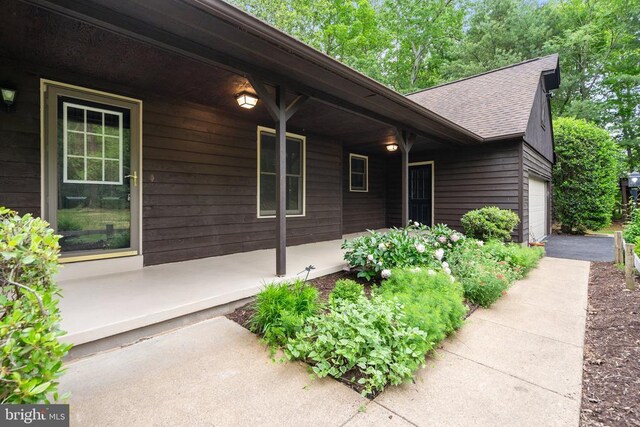 15395 Rillhurst Dr, Culpeper, VA 22701 - property entrance with a porch and a shingled roof