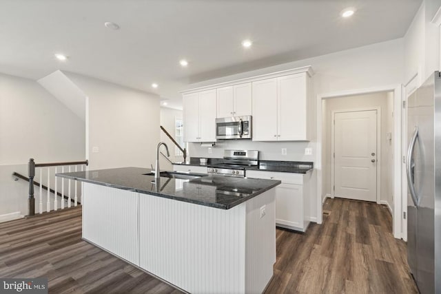6520 Wild Orchid Ct, Fredericksburg, VA 22407 - kitchen featuring stainless steel appliances, a sink, dark wood finished floors, white cabinetry, and recessed lighting