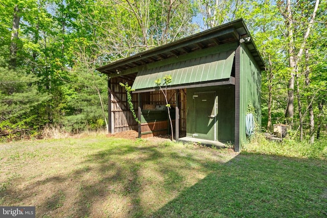 view of outbuilding with an outbuilding