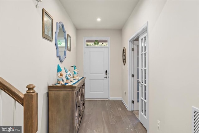 11326 Oakville Ln, Spotsylvania, VA 22551 - foyer with wood finished floors, french doors, and recessed lighting