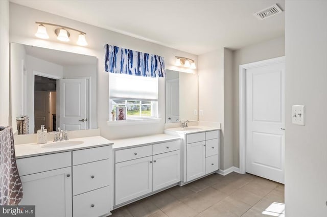 11326 Oakville Ln, Spotsylvania, VA 22551 - bathroom with two vanities and tile patterned flooring