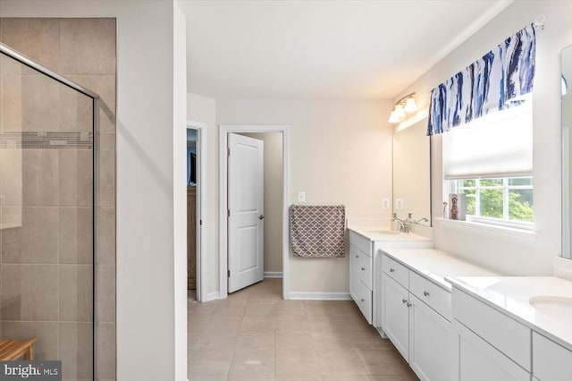 11326 Oakville Ln, Spotsylvania, VA 22551 - full bathroom with vanity, a shower stall, and tile patterned floors