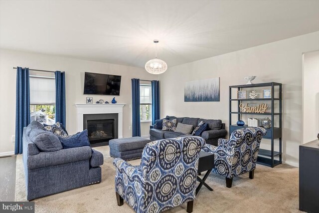 11326 Oakville Ln, Spotsylvania, VA 22551 - living room with carpet flooring, a fireplace with flush hearth, and healthy amount of natural light