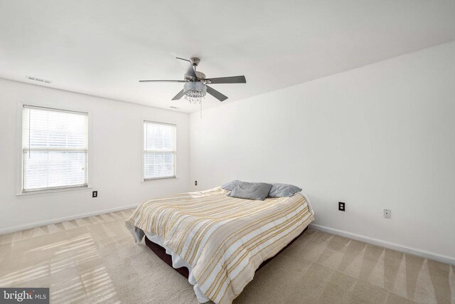10501 Crestfield Ln, Spotsylvania, VA 22553 - bedroom featuring light carpet, baseboards, and a ceiling fan