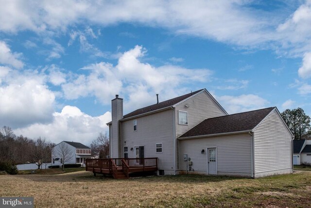 10501 Crestfield Ln, Spotsylvania, VA 22553 - rear view of house with a wooden deck, a lawn, a chimney, and a shingled roof