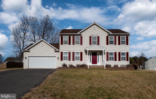 10501 Crestfield Ln, Spotsylvania, VA 22553 - colonial home featuring asphalt driveway and an attached garage