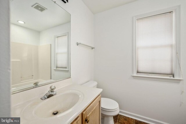 10501 Crestfield Ln, Spotsylvania, VA 22553 - bathroom with toilet, vanity, baseboards, and tile patterned floors