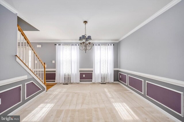 10501 Crestfield Ln, Spotsylvania, VA 22553 - unfurnished dining area with a chandelier, stairs, and crown molding