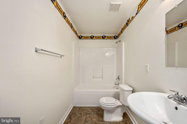 10501 Crestfield Ln, Spotsylvania, VA 22553 - bathroom featuring a sink, toilet, washtub / shower combination, and baseboards