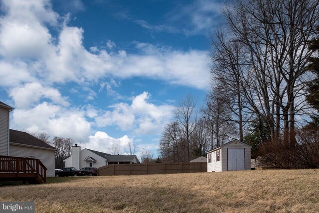 10501 Crestfield Ln, Spotsylvania, VA 22553 - view of yard with a shed, a deck, and an outdoor structure
