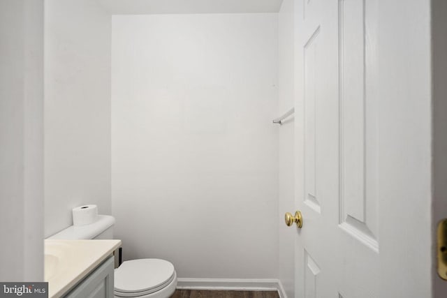 10501 Crestfield Ln, Spotsylvania, VA 22553 - bathroom featuring vanity, toilet, and baseboards