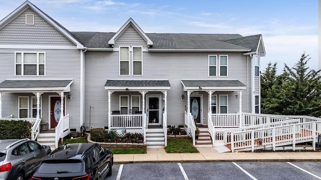 1294 Victorian Village Dr, Harrisonburg, VA 22802 - view of front of home featuring covered porch, uncovered parking, and roof with shingles