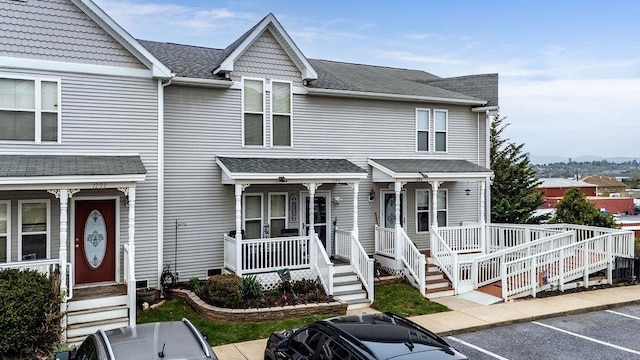 1294 Victorian Village Dr, Harrisonburg, VA 22802 - view of front of house with covered porch, a shingled roof, and uncovered parking