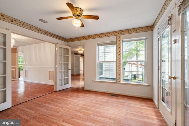 4117 Dartmoor Ct, Fredericksburg, VA 22408 - spare room featuring french doors, baseboards, light wood-style floors, and a ceiling fan