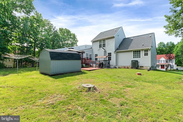 4117 Dartmoor Ct, Fredericksburg, VA 22408 - rear view of property with a deck, a yard, and central AC