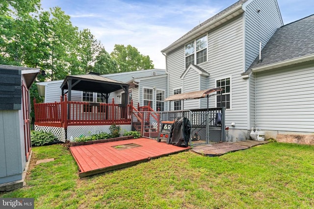 4117 Dartmoor Ct, Fredericksburg, VA 22408 - rear view of property featuring a gazebo, a wooden deck, a lawn, and a shingled roof