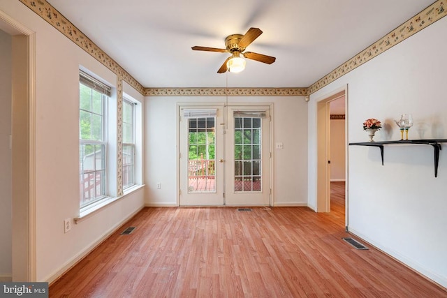 4117 Dartmoor Ct, Fredericksburg, VA 22408 - unfurnished room with healthy amount of natural light, light wood-style flooring, and a ceiling fan