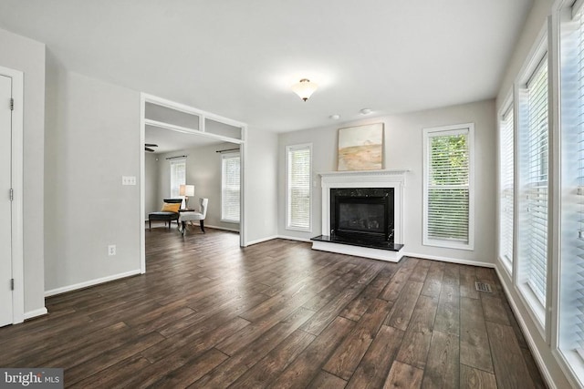 6205 Patrician Ct, Fredericksburg, VA 22407 - unfurnished living room with dark wood-style flooring and a fireplace