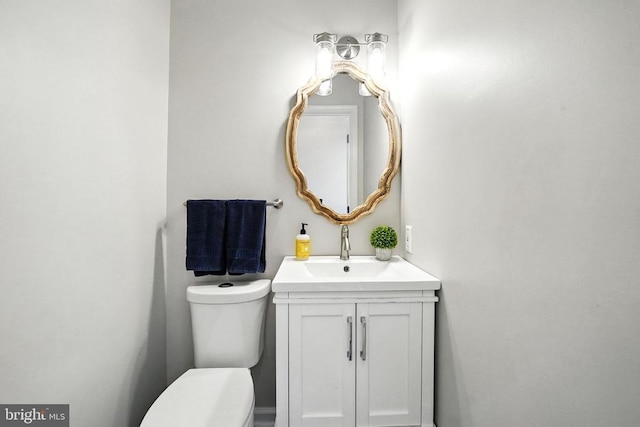 6205 Patrician Ct, Fredericksburg, VA 22407 - half bathroom featuring vanity and toilet
