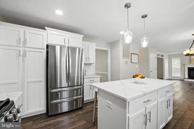 6205 Patrician Ct, Fredericksburg, VA 22407 - kitchen with appliances with stainless steel finishes, dark wood-style flooring, white cabinetry, backsplash, and recessed lighting