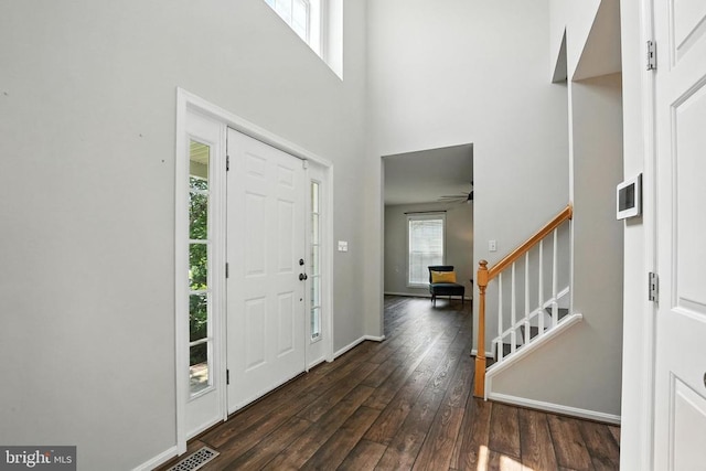 6205 Patrician Ct, Fredericksburg, VA 22407 - entrance foyer featuring a towering ceiling, dark wood-type flooring, stairway, and ceiling fan