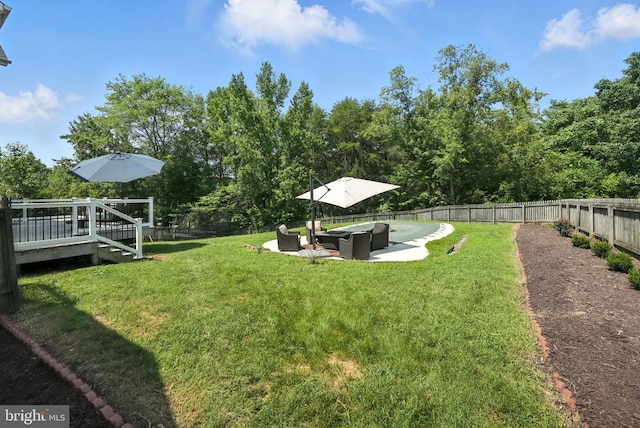 6205 Patrician Ct, Fredericksburg, VA 22407 - fenced backyard featuring an outdoor hangout area, a wooden deck, and a patio