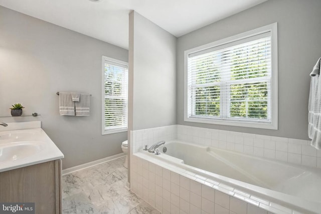 6205 Patrician Ct, Fredericksburg, VA 22407 - bathroom with plenty of natural light, a bath, double vanity, and marble look tile flooring