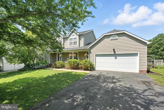 6205 Patrician Ct, Fredericksburg, VA 22407 - traditional home featuring asphalt driveway and a garage
