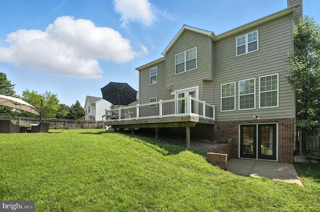 6205 Patrician Ct, Fredericksburg, VA 22407 - rear view of house featuring a wooden deck, a chimney, brick siding, and french doors