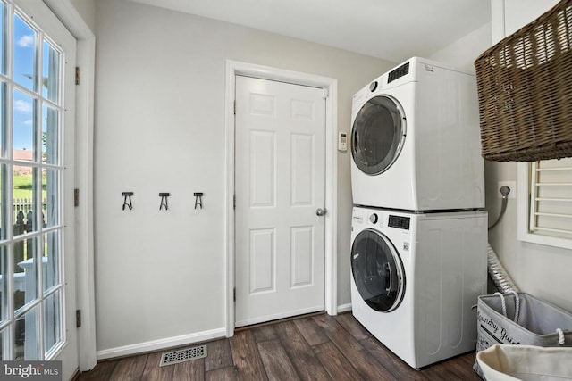 6205 Patrician Ct, Fredericksburg, VA 22407 - washroom with stacked washer / drying machine and dark wood-type flooring