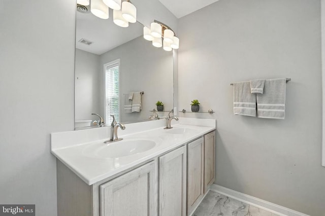 6205 Patrician Ct, Fredericksburg, VA 22407 - bathroom with marble look tiles and double vanity