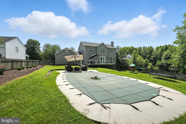6205 Patrician Ct, Fredericksburg, VA 22407 - view of pool with a playground, a patio area, and a trampoline