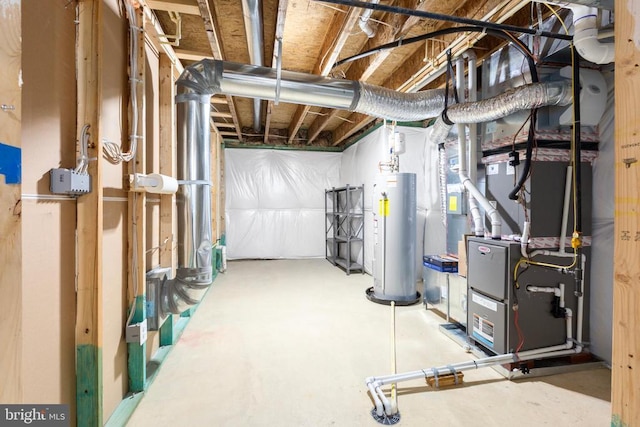 unfinished basement featuring water heater and heating unit