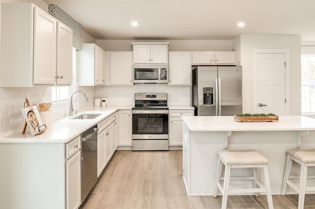 108 Courtyard Ter, New Market, VA 22844 - kitchen with appliances with stainless steel finishes, plenty of natural light, light wood finished floors, and recessed lighting