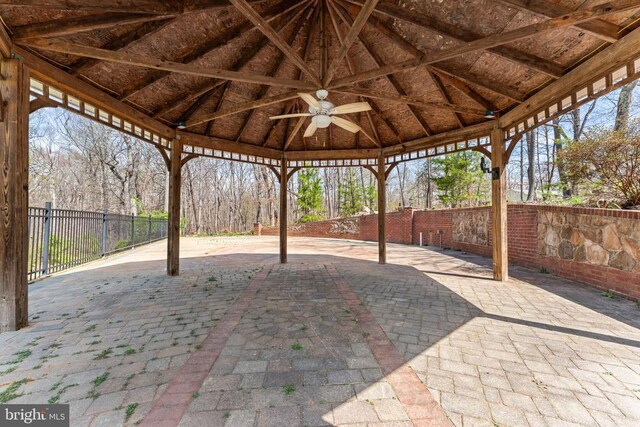 view of patio / terrace with a gazebo and fence
